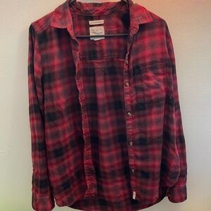 Red flannel. Perfect condition- could use an iron